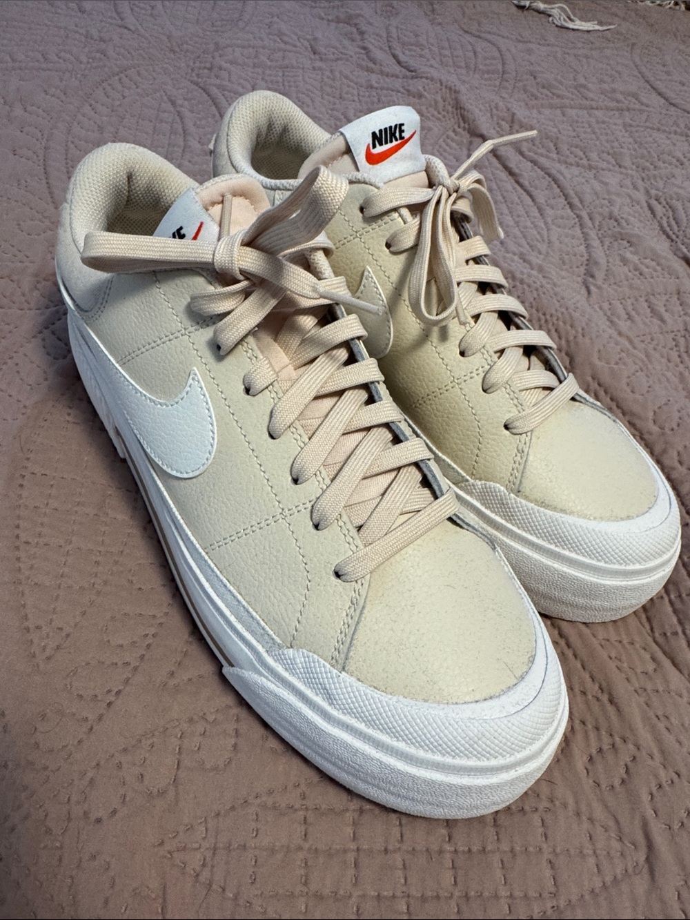 Nike Beige/Cream Low-Top Sneakers with White Swoosh